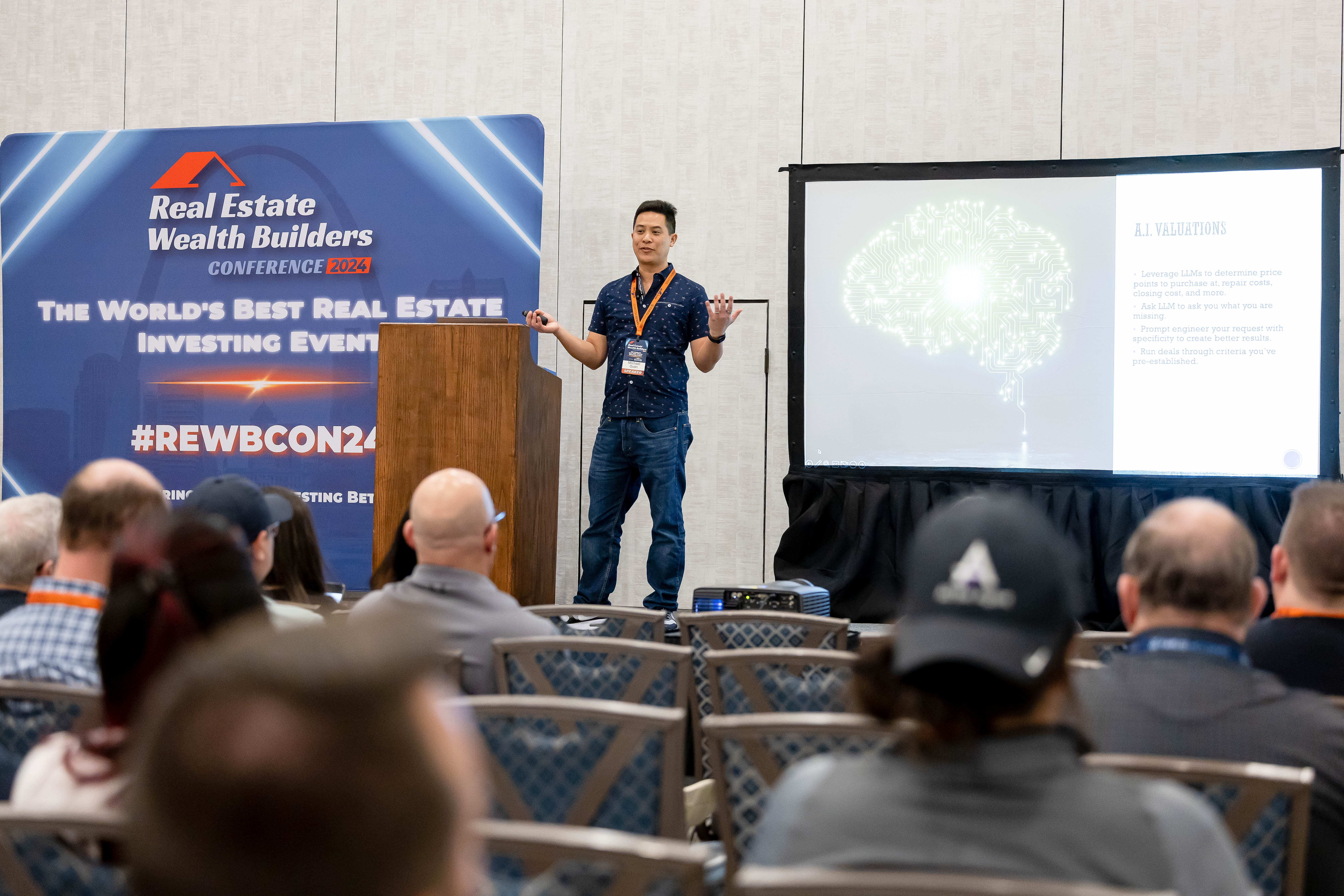 Michael Quan at the podium