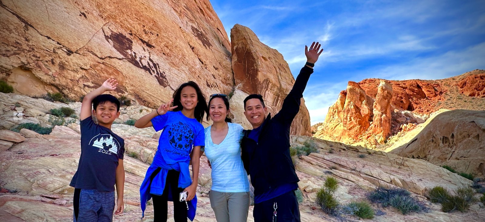 Family celebrating in the red rocks